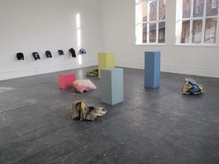 Bunches next to corresponding coloured plinths.