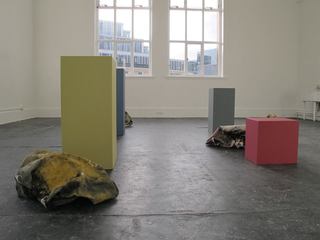 Bunches next to corresponding coloured plinths.