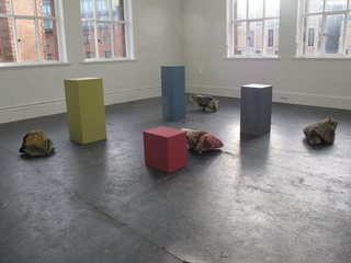 Bunches next to corresponding coloured plinths.