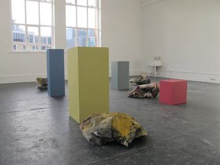 Bunches next to corresponding coloured plinths.